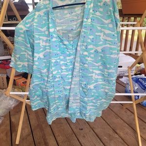Preowned Vintage bathing suit with covering. Turquoise fish on white background